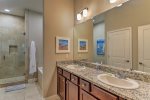 Lovely up-to-date master bath with easy access walk-in shower and dual vanities